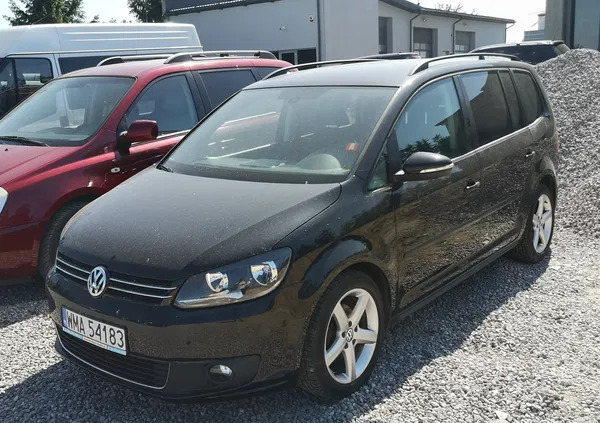 samochody osobowe Volkswagen Touran cena 36900 przebieg: 161000, rok produkcji 2012 z Brwinów